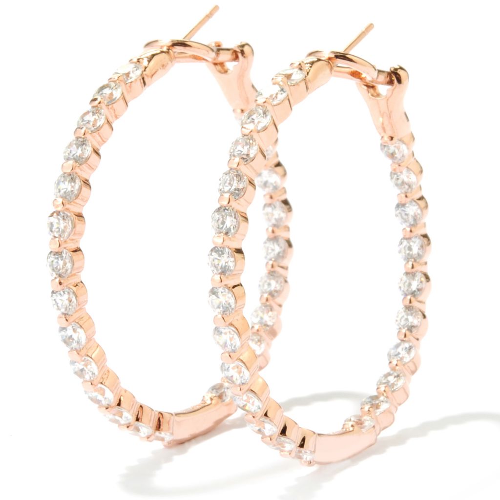 /> in the Platinum Embraced option. I have smaller Diamond hoops in YG but have always thought that in some things WG shows better. I ordered these on a whim during one of SHQ's recent 15% off promotions. I received the earrings just before Christmas and I am really impressed. They are currently sold out but the number is <strong>134-464</strong>.</p> <p>Although the description states that the DEW is a little over 4 ct - 2 per earring - they do not look ostentatious. One reason is because the white stones in the white metal is not as much of a contrast as it would be in either of the other two choices. I cannot wear SS earrings for an extended period so these will be relegated to special occasions of a couple of hours at the most. Last Saturday I wore them to a gathering and my friends assumed they were real. I'll be honest, as they 