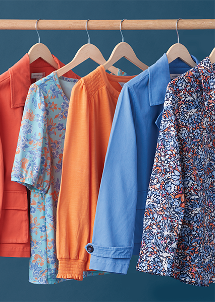 Christopher & Banks Tops: A collection of stylish tops featuring vibrant jackets, a blue floral print puff sleeve top, a blue shirring detail top, and a pink pintucked sleeve peasant blouse!