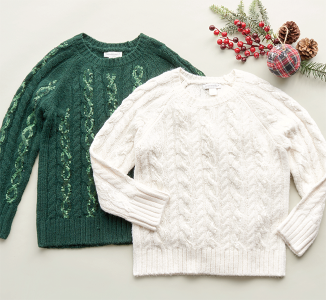 A pair of our seasonal sweaters.