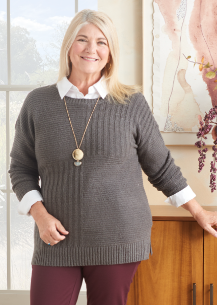 Comfortable, relaxing sweaters, a beautiful pendant, and jeans make a stylish combo for the season.