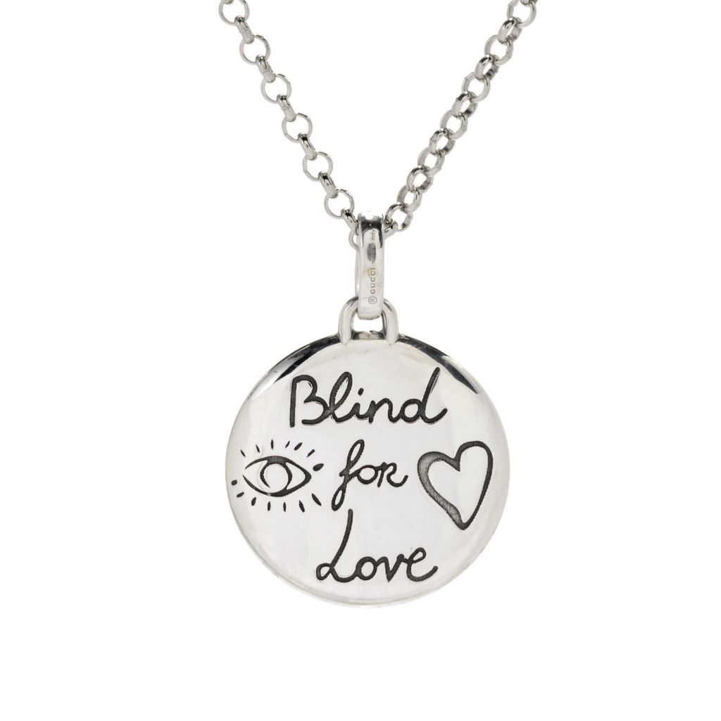 blind for love gucci ring meaning