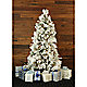 Artificial Christmas tree with presents