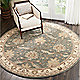 8' round rug in living room 