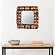 Copper-tone wall mirror