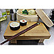 Chopsticks with sushi