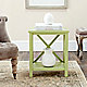 Green end table in room