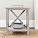 Grey end table in room