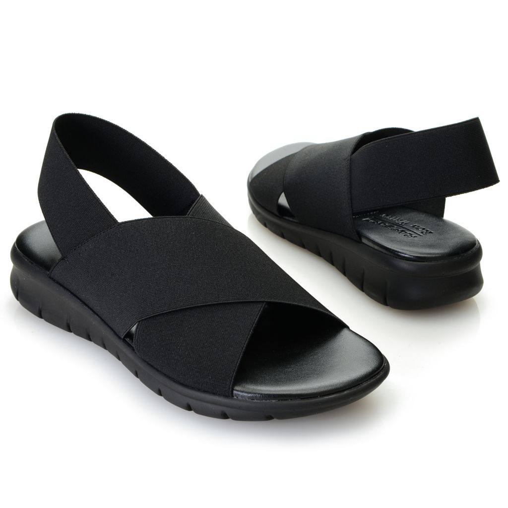 white elastic sandals