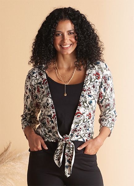 A stylish print over a simple, solid, shirt and pants.
